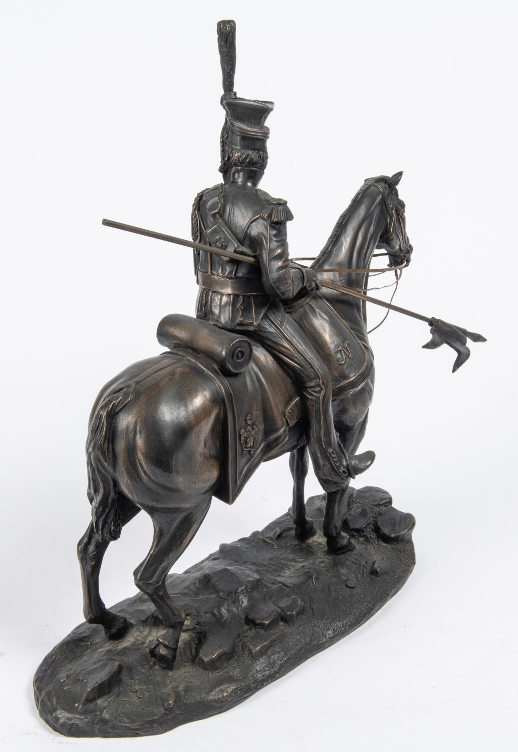 A bronzed composition equestrian figure of a French Napoleonic period mounted lancer, with lowered - Image 3 of 3