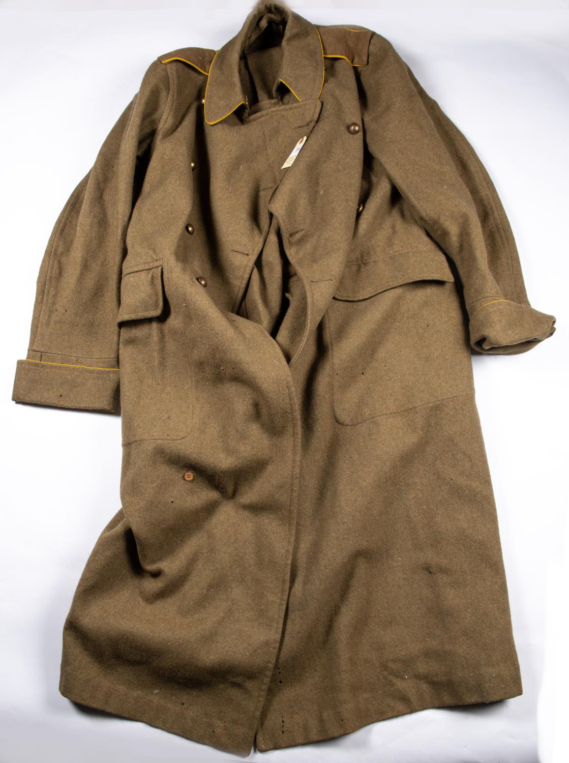 A scarce Yeomanry officers khaki greatcoat c 1902, it is a light shade of khaki and has yellow