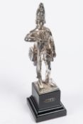 A good silver figurine of a 1745 Grenadier, mounted on an ebonised plinth, London HM on base, height
