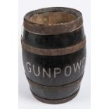 An oak barrel, painted black with "GUNPOWDER" in large white letters, height 15½" maximum,