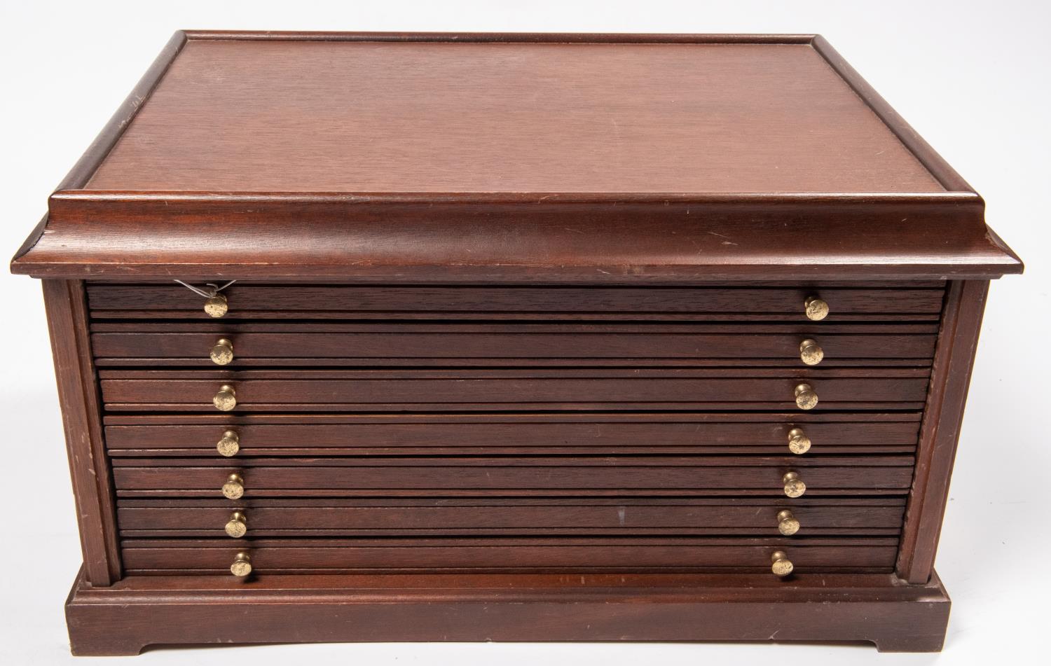 A mahogany collectors cabinet, with five shallow drawers, each to house 20 medallions, and a