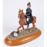 A figure of the Duke of Wellington on horseback, decorated composition construction, on decorative