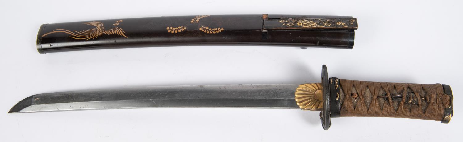 A nicely mounted short wakizashi with o-suriage unsigned blade 31.4cms, some chips and edge nicks.