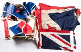 A printed Union flag, 46" x 78", another small Union flag (stitched); and a box of red, white and