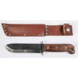 A military sheath knife, blade 7", wood hilt stamped 1988 etc, in its brown leather sheath. GC £30-