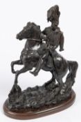 A bronzed composition equestrian figure of an early 19th century French hussar wearing shako with