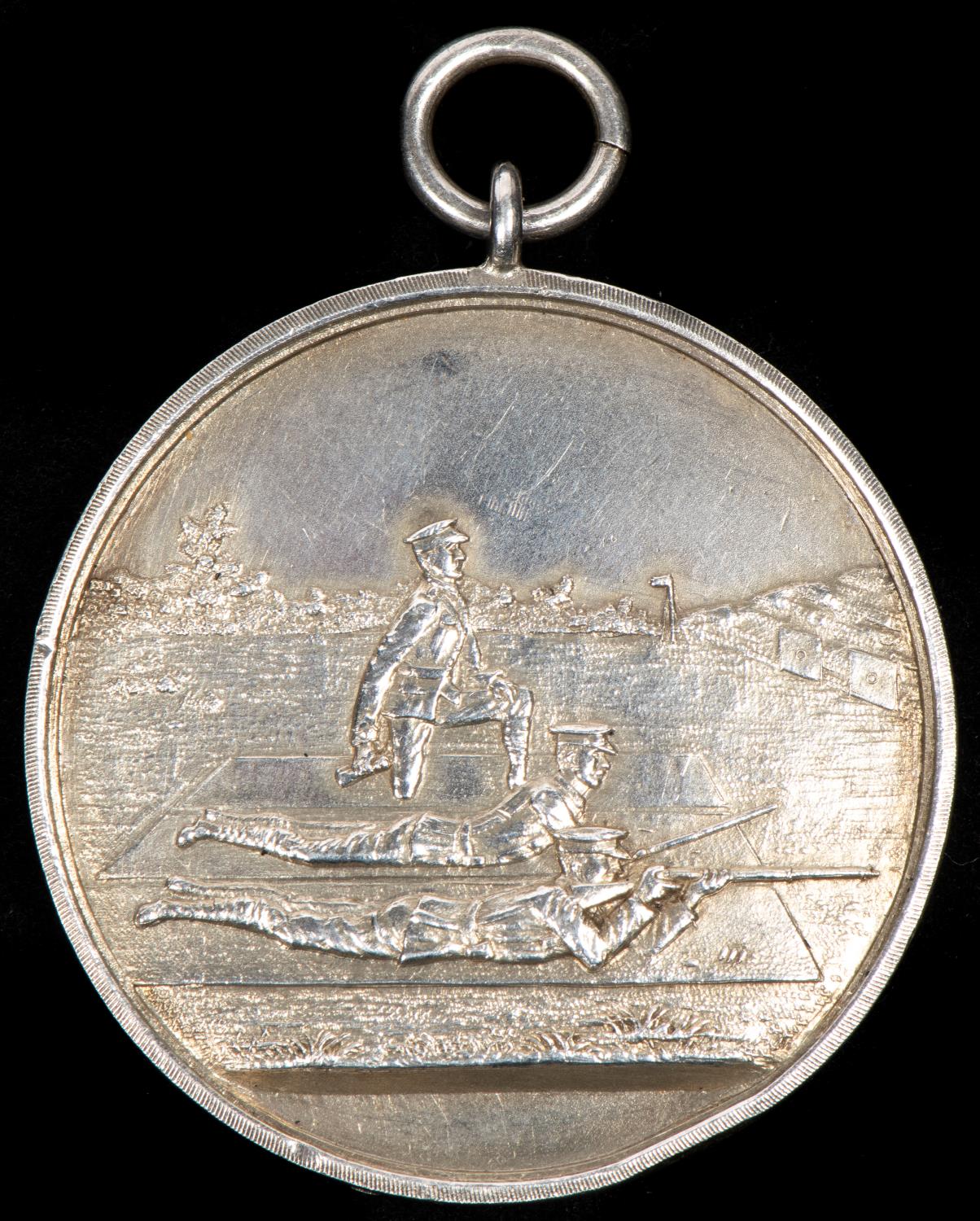 "Wickham Bishops Rifle Club" silver shooting medal, obverse 2 military personnel prone firing at a