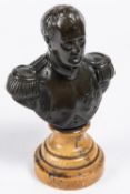 A bronzed bust of Napoleon Bonaparte, with marble circular base, height 8", signed "Renault". VGC £