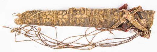 An 18th century or earlier Indian quiver, of hide, the front covered with heavily embroidered
