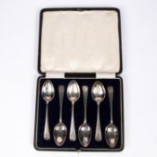 A set of 6 silver regimental prize teaspoons, the stems terminating in the badge and cypher of the