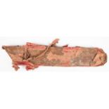 An 18th century or earlier Indian quiver, of hide covered with red velvet, and having velvet covered