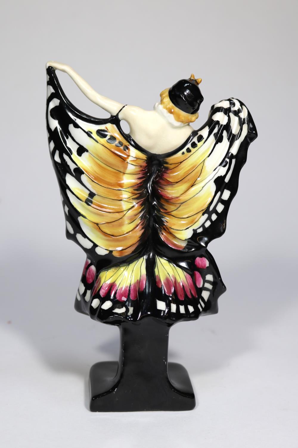 A Royal Doulton 'Butterfly' figurine (HN719) in pink, black and yellow. Designed by L. Harradine. - Image 2 of 3