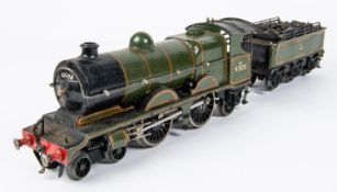 An O gauge clockwork BR 4-4-2 tender locomotive, 62105, in lined green livery. QGC, adapted,
