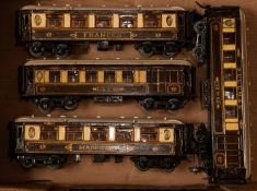 4x O gauge Pullman Cars with tinplate bodies and detailed interiors possibly by Bing or Marklin,