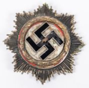 A Third Reich German Cross, gilt wreath, marked on reverse "Ob FW Ulrich Mundt 5/St G.1. 9.4.42", GC