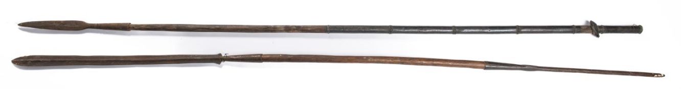 A Masai lion spear, length 72", wooden haft; also an Indian boar spear with metal bound haft. GC (2)