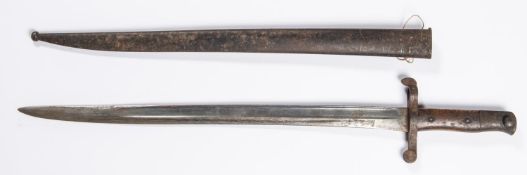 A sword bayonet, blade 18½” marked “Steyr 1886”, in its steel scabbard. GC £30-40