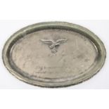 A Third Reich white metal salver, with applied Luftwaffe badge, 9½" x 6", engraved "1942 Fur