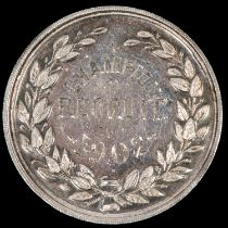 Devon County Volunteer Assocn. silver medal, obverse struck kneeling rifleman right with engraved