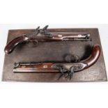 A good quality pair of officer's 16 bore flintlock holster pistols by "J.No. Jones & Co",