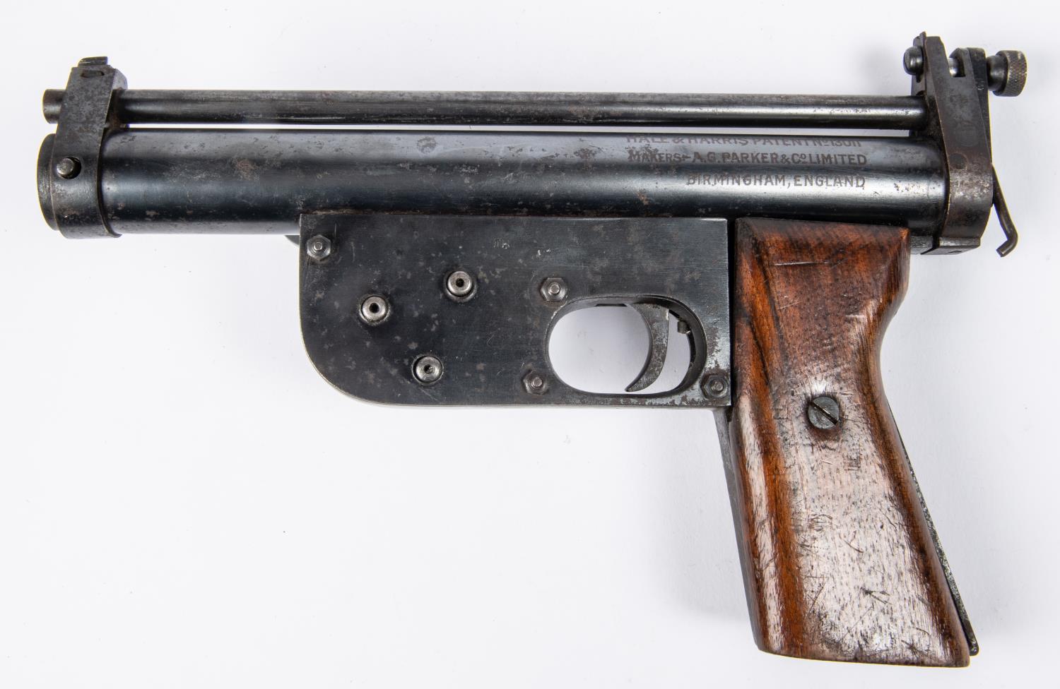 A rare .177" Parker Patent Precision crank wound air pistol, number 15, the air chamber etched on