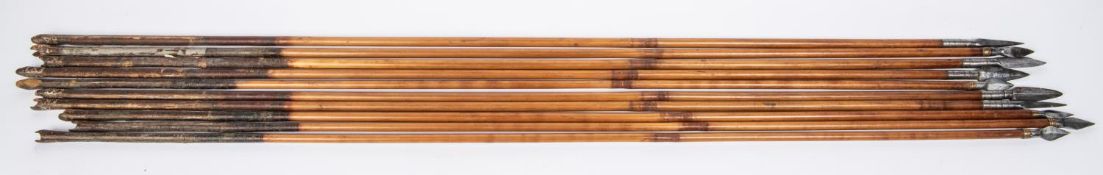 Ten 18th century Indian arrows, some with flat diamond shaped heads, one with triangular section