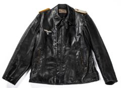 A Third Reich Luftwaffe officer's black leather flying jacket, complete with insignia, label