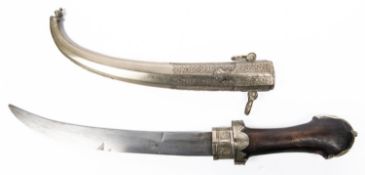 An Arab jambiya, curved blade 9½”, WM mounted wood hilt, in its WM sheath with 2 hanging rings.