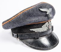 A Third Reich Luftwaffe NCOs peaked cap, brown piping, alloy insignia GC (some mothing). £150-175