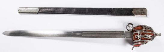 A heavy Scottish basket hilted broadsword, post WWII, double edged blade 32½", nicely fretted