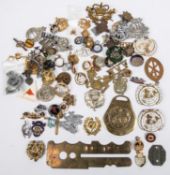 Over 70 various pin back military lapel and other badges, including four enamelled UN beret