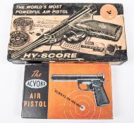 An empty carton for an "Acvoke" air pistol, with orange and black lid, containing simple leaflet