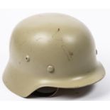 A Third Reich M36 steel helmet, no decals, light grey/green finish, lining possibly post war. VGC £