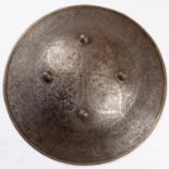 A good Indian shield dhal, 17½" diameter, heavily etched with Indian scenes, characters and