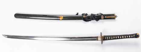 A good quality modern katana with mock tortoiseshell mounting, and tempered grooved unsigned