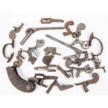 A small quantity of antique gun parts, including four hammers for percussion Colt revolvers, Adams
