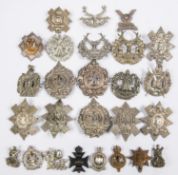 18 Scottish white metal glengarry badges, including Black Watch (5), Argyll & Sutherland (3), and