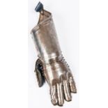 A good quality reproduction armour gauntlet, constructed of riveted steel with articulated