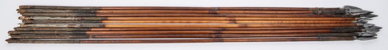 Ten 18th century Indian arrows, one with chisel head, the rest leaf shaped, some with central rib,