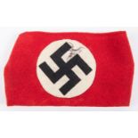 A Third Reich NSDAP arm band with applied swastika motif. GC £200-250