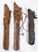 An 18th century Indian leather quiver, 25" overall, its leather slings wrapped around it, QGC;