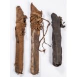 An 18th century Indian leather quiver, 25" overall, its leather slings wrapped around it, QGC;