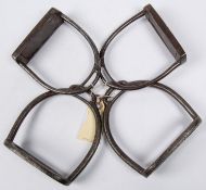 A pair of interesting old (18th-19th century) iron stirrups, of which one arm and the foot plate can