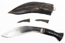 A Gurkha kukri, blade 11", in its sheath complete with skinning knives. GC £30-40