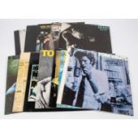 13x Tom Waits LP record albums and 12" singles. Including; Rovers Return. Closing Time. The Heart of