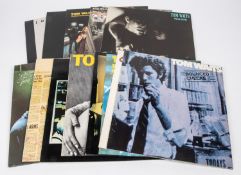 13x Tom Waits LP record albums and 12" singles. Including; Rovers Return. Closing Time. The Heart of