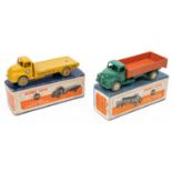2 Dinky Supertoys Leyland Comet. A Comet Wagon, with hinged tailboard (532). Dark green cab and