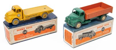 2 Dinky Supertoys Leyland Comet. A Comet Wagon, with hinged tailboard (532). Dark green cab and