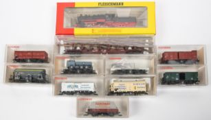 Fleischmann HO DR Class 56 2-8-10 tender locomotive, RN56 2048, in black and red livery. Together