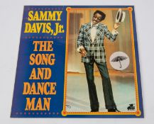 Sammy Davis Jr. signed LP record album; The Song and Dance Man. Signed to reverse of cover in red